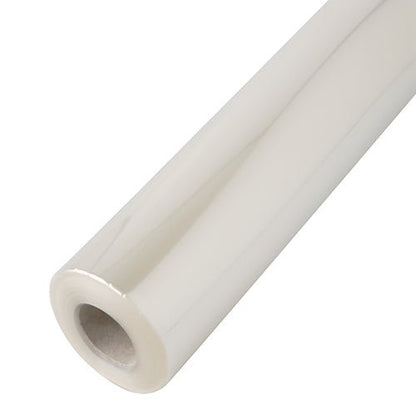 A close-up of the unprinted Starpak transparent film with a cardboard core and transparent surface is shown at an angle against a white background to highlight its versatile uses.