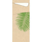 A green palm leaf lies diagonally on a brown, textured surface. At the top is a white envelope flap - matching the Sacchetto tissue 190 x 85 mm from Duni GmbH - partially visible.