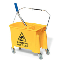 The Nölle Profi Brush cleaning cart, 15 liters from Nölle Profi Brush Bürsten- & Pinseltechnik e.K., is a yellow cart with wheels, handle, and wringer including "Caution Wet Floor" sign, ideal for professional cleaning.