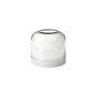 Under a clear glass dome with a flat bottom sits a stack of white, round objects resembling the LED candle holder made of plastic Stella by Duni GmbH - decorative and durable. The background is solid white. The package contains 1 piece.
