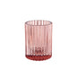 The candle holder 70x55 mm, Comodo earth pink by Duni GmbH is characterized by elegant vertical grooves and a textured bottom reminiscent of a stylish glass candle holder, and is shown against a white background. Package: 1 piece.