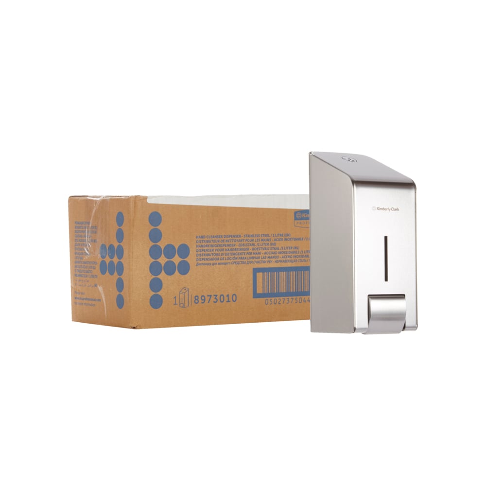A brown box with blue graphics stands next to a Kimberly-Clark GmbH Professional™ dispenser for washing lotions - an elegant 1-liter wall-mounted stainless steel dispenser for washing lotions, delivered as a single unit in the box.