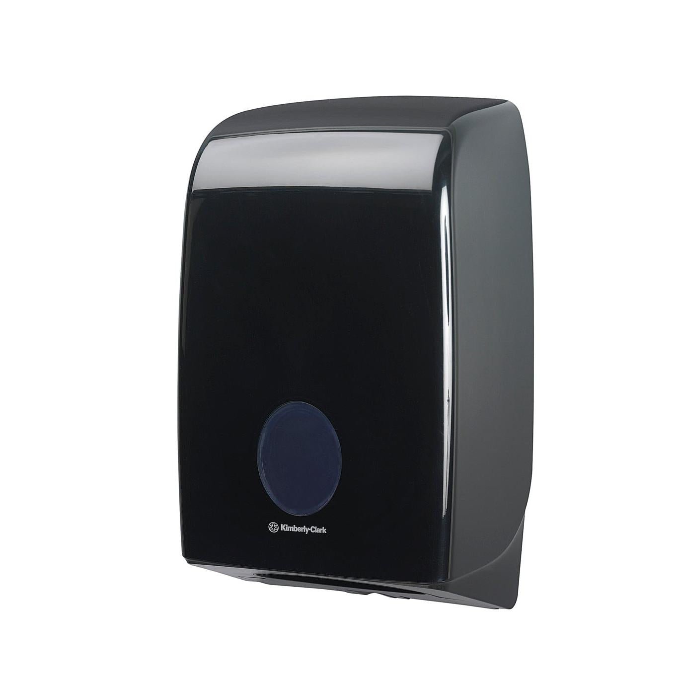 The black Aquarius™ dispenser for folded towels (Interfold) by Kimberly-Clark GmbH features a round front opening and a logo underneath and is designed for wall mounting. 1 dispenser per box, depicted on a white background.