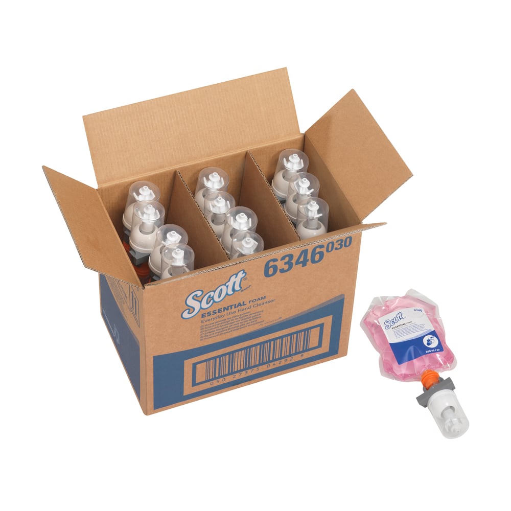 A carton labeled "Scott® ESSENTIAL™ foam soap for daily use" from Kimberly-Clark GmbH contains 12 pink 200-ml soap cartridges, with one refill pack depicted outside the carton.