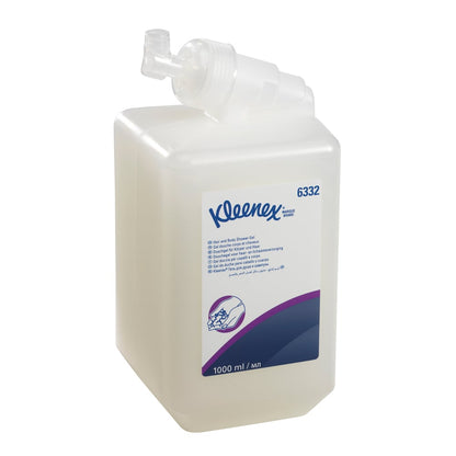 A clear 1L Kleenex® Hair and Body Shampoo cassette from Kimberly-Clark GmbH, with a white label and dispenser, contains information about mild care and effective cleaning in blue and purple text. Sold as 6 cassettes per carton.