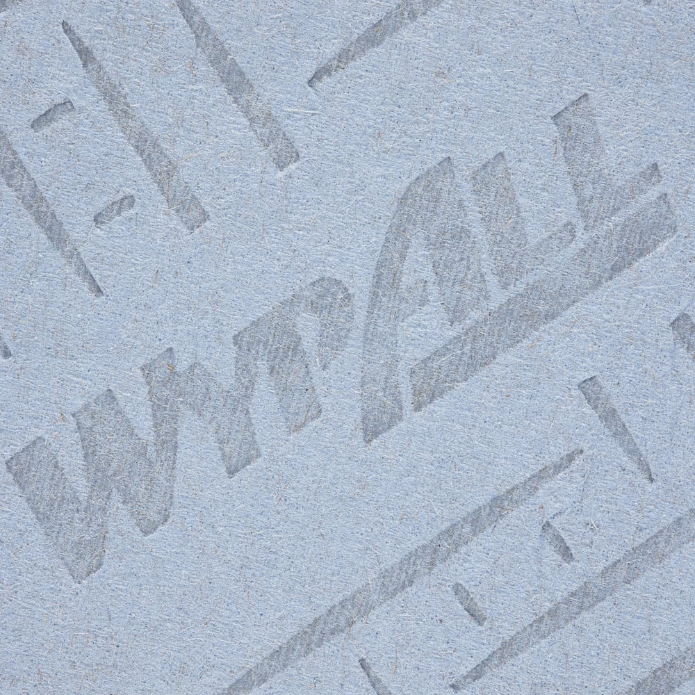 Close-up of a blue, textured WypAll® L20 paper wipe from Kimberly-Clark GmbH, showing the embossing pattern typical for this extra-wide surface cleaning roll (1 roll x 1000 sheets) for effective absorbency.