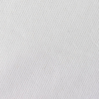 Close-up of Scott® doctor's rolls (38.00 cm x 51.00 cm) from Kimberly-Clark GmbH: white, textured surface with subtle diagonal weave and small grooves, ideal for hygienic patient care on medical examination couches.
