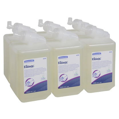 Six transparent 1-liter Kleenex® Gentle Wash Lotion cassettes from Kimberly-Clark GmbH are arranged in two rows, each showing the brand name and product information on the label; the package contains 6 cassettes per carton.