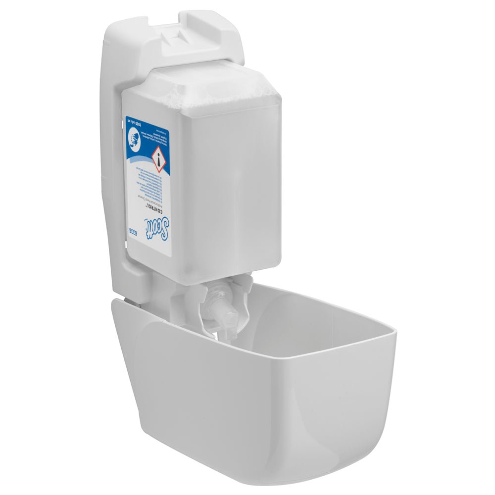 A wall-mounted Kimberly-Clark Scott® Control™ dispenser contains a transparent 1-liter cassette with antibacterial hand cleanser for hygienic use, featuring an open front display and rectangular drip tray. The package contains 6 cassettes per carton.
