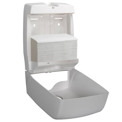 A white wall dispenser is open and shows a stack of Hostess™ NATURA™ hand towels - zig-zag fold, small (23 x 25 cm) from Kimberly-Clark GmbH. The lid is flipped up, the lower compartment remains empty.