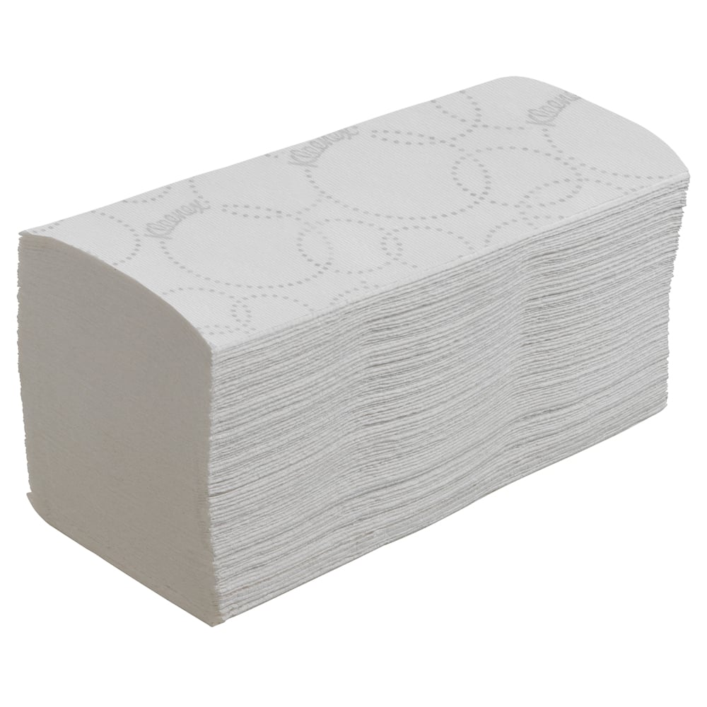 A stack of Kleenex® Ultra™ Interfold folded hand towels (white, 15 clips x 96 sheets) from Kimberly-Clark GmbH with a subtle dotted border pattern, ideal for hygienic hand drying, presented against a plain white background.