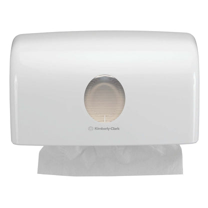 The Aquarius™ dispenser for folded towels - MultiFold White (Small) from Kimberly-Clark GmbH is a wall-mounted towel dispenser with a viewing window for hygienic single dispensing - ideal for any washroom.