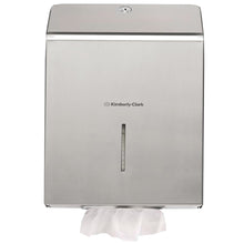 The Kimberly-Clark Professional™ stainless steel towel dispenser from Kimberly-Clark GmbH is wall-mounted and ensures hygienic hand drying with a visible white paper towel at the bottom dispensing compartment.