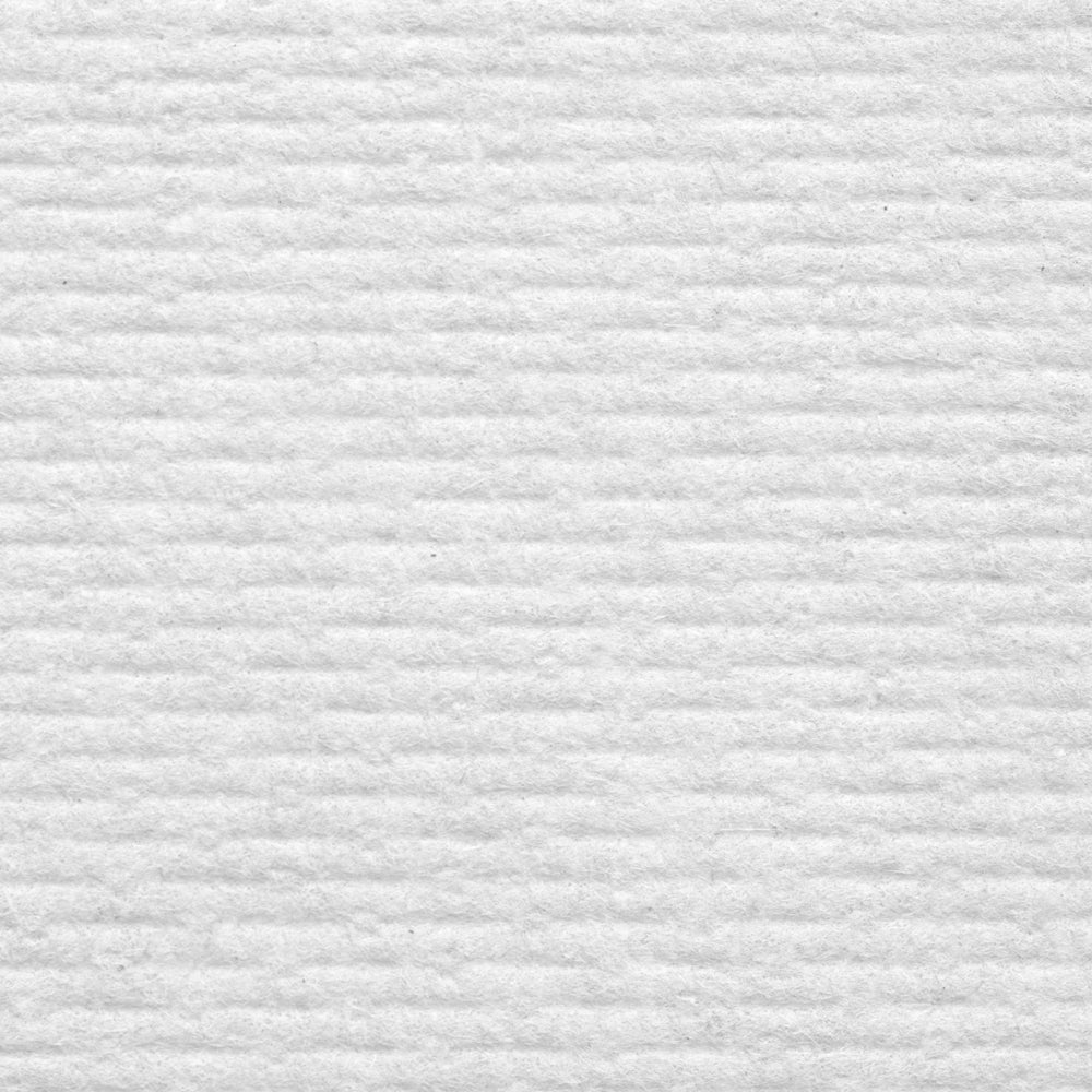 The close-up of a white Kimberly-Clark GmbH WypAll® L10 paper towel shows horizontal grooves and subtle shadows highlighting the texture - ideal for center-pull dispensing in cleaning, service & retail. No additional patterns or markings are visible. 6 rolls with 390 sheets each.