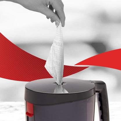 A hand pulls a WypAll® Reach™ paper towel for food & hygiene - centerfeed from Kimberly-Clark GmbH out of a black-gray grip container, ensuring hygiene - ideal for food processing establishments.