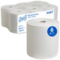 A large Scott® hand towel roll (304.00 m x 19.80 cm) from Kimberly-Clark GmbH stands in front of a six-pack, labeled with "6 x 304 m = 1,824 m" and marked with the number 6667.