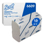 A pack and a stack of Scott® Hand Towels - Narrow-Fold / White by Kimberly-Clark GmbH; 16 packs with 220 towels (3,520 total) for hygienic hand drying. White packaging with blue text and branding.