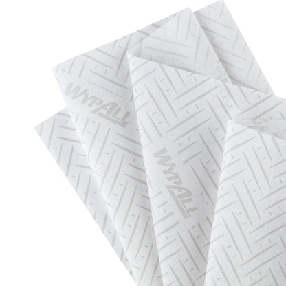 Four WypAll® L10 paper towels from Kimberly-Clark GmbH with a gray chevron pattern are shown overlapping - ideal as centrefeed refills for Reach+™ dispensers in service & retail cleaning. Size: 38.00 x 18.30 cm.