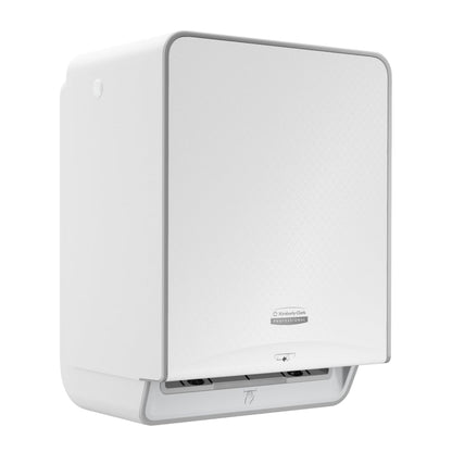 The Kimberly-Clark Professional™ Icon™ Electronic Hand Towel Dispenser in White has a rectangular shape with rounded edges, a wall-mounted design, a logo on the front, and an opening at the bottom for hygienic, touchless hand drying.