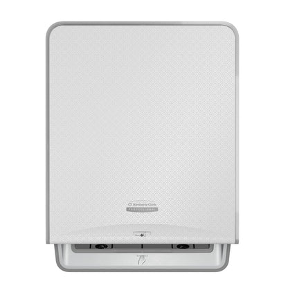 The Kimberly-Clark Professional™ Icon™ Electronic Rolled Hand Towel Dispenser in white by Kimberly-Clark GmbH features touchless operation, a subtle texture, and a slot with a hand symbol for hygienic hand drying.
