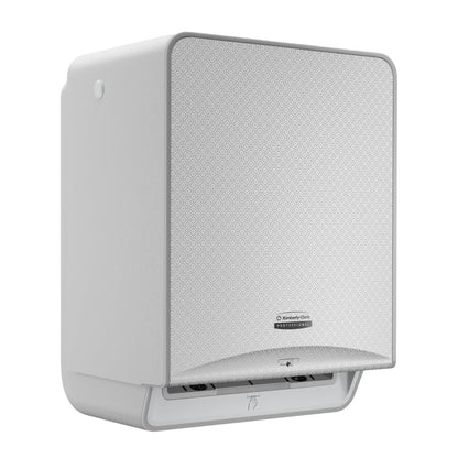 The Kimberly-Clark Professional™ Icon™ Electronic No Touch - Loose Module - Roll / Silver Mosaic from Kimberly-Clark GmbH is a wall-mounted, touchless paper towel dispenser with a textured silver mosaic front and a bottom opening for towel dispensing.