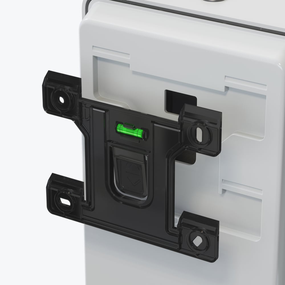 A close-up of the black bracket of the Kimberly-Clark Professional™ Icon™ electronic skincare dispenser, Silver Mosaic, 1.2 l, with built-in green spirit level for precise installation of this hygienic solution.
