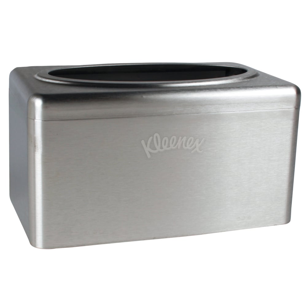 The Kleenex® towel dispenser made of stainless steel by Kimberly-Clark GmbH is a compact, chrome-plated tissue box cover with an oval lid opening and "Kleenex" engraving, featuring a practical pull-box function for easy removal. Contains 2 dispenser boxes per carton.