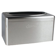 The Kleenex® towel dispenser made of stainless steel by Kimberly-Clark GmbH is a compact, chrome-plated tissue box cover with an oval lid opening and "Kleenex" engraving, featuring a practical pull-box function for easy removal. Contains 2 dispenser boxes per carton.