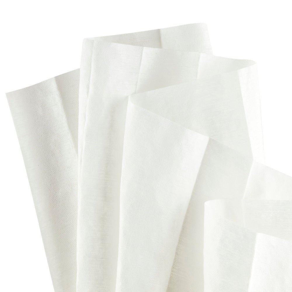 Several WypAll® X60 General Clean Tissues from Kimberly-Clark GmbH measuring 41.80 cm x 28.30 cm are arranged vertically with slightly uneven edges against a solid white background, showing the texture of the paper.