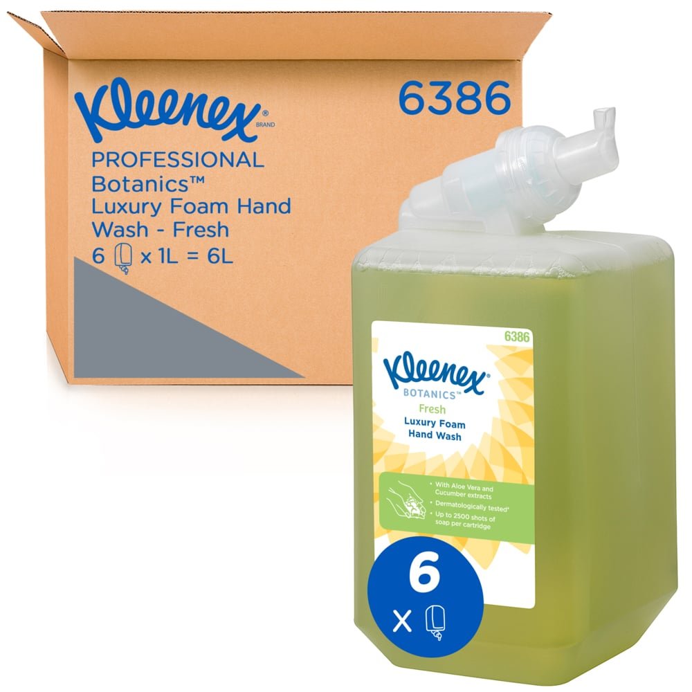 A brown shipping box with the label "Kleenex 6386" from Kimberly-Clark GmbH contains six 1-liter cartridges of Kleenex® Botanics™ Luxury Foam Hand Wash with botanical extracts, totaling 6 liters.
