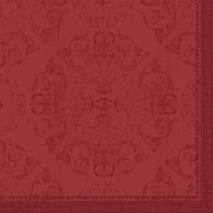 The Dunilin napkins 40 x 40 cm 1/4 fold by Duni GmbH are characterized by a red, ornate, symmetrical floral and snail pattern with a textured look and a decorative border on the right and bottom edge - perfect for the set table.