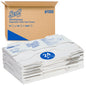 A box labeled "Scott® Toilet Seat Covers - White" from Kimberly-Clark GmbH contains 24 bags with 125 covers each (a total of 3,000) for hygienic toilet use, with the individually packaged covers shown at the front.
