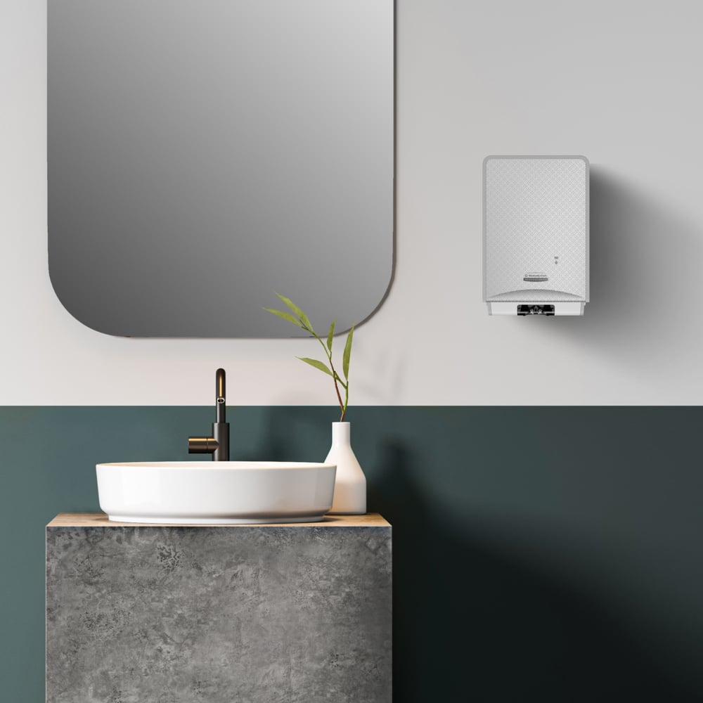 In a modern bathroom with a rectangular mirror, white vessel sink on a concrete countertop, and black faucet, Kimberly-Clark GmbH Scott® CONTROL alcohol-based hand sanitizing foam (1.2L) ensures excellent hand hygiene.