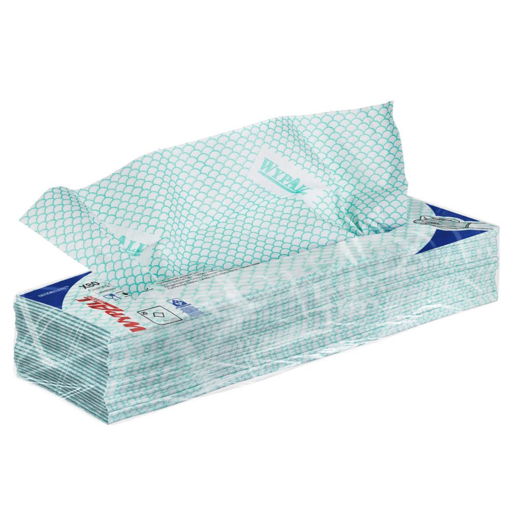 From a rectangular pack of WypAll® X80 Critical Clean - Interfold (41 x 33 cm) from Kimberly-Clark GmbH, predominantly white with light green geometric patterns and blue accents, a wipe is partially pulled out.