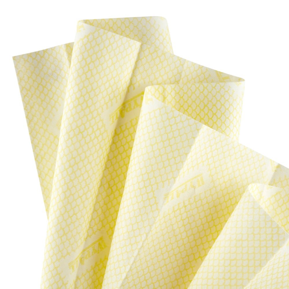A close-up of several light yellow WypAll® X80 Critical Clean - Interfold cloths (41.00 cm x 33.00 cm) from Kimberly-Clark GmbH, with a subtle geometric pattern, layered on a white background. Ideal for industrial cleaning.