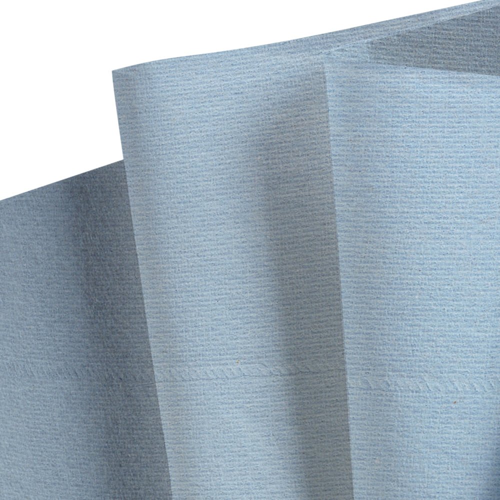 A close-up of light blue, textured WypAll® L20 General Clean wipes from the BRAG™ Box by Kimberly-Clark GmbH, with visible folds and seams along a crease.
