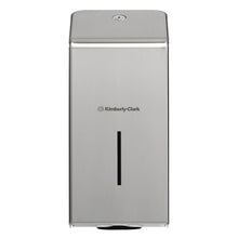The Kimberly-Clark Professional™ stainless steel toilet paper dispenser from Kimberly-Clark GmbH is wall-mounted and features a rectangular design, a narrow vertical window for fill level control, and a closure or button at the top.