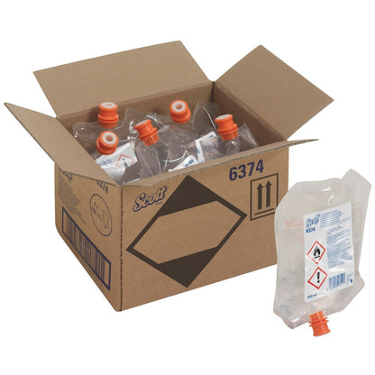 An opened box labeled "Scott® Cleaner for toilet seats and other surfaces" from Kimberly-Clark GmbH contains six transparent 400 ml dispenser pouches, one of which is externally equipped with an orange cap, a warning label, and hazard symbols.