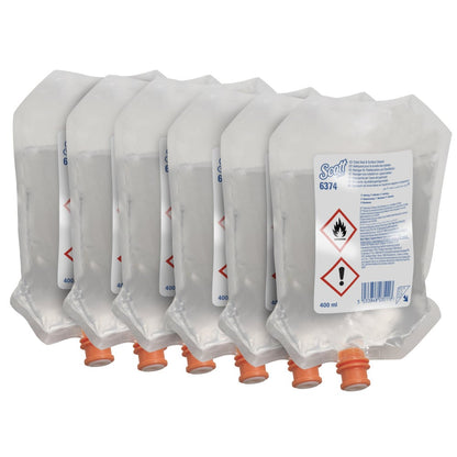 Six transparent 400 ml Scott® Cleaner for toilet seats and other surfaces dispenser pouches from Kimberly-Clark GmbH, each with an orange cap and a white safety-labeled sticker, are neatly arranged in a box with 6 pouches.
