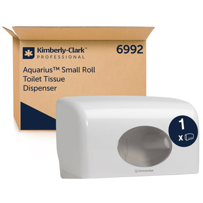 A white Aquarius™ toilet paper dispenser - small rolls (18.00 cm x 29.80 cm x 12.80 cm) from Kimberly-Clark GmbH is depicted in front of a brown box with brand and product information.
