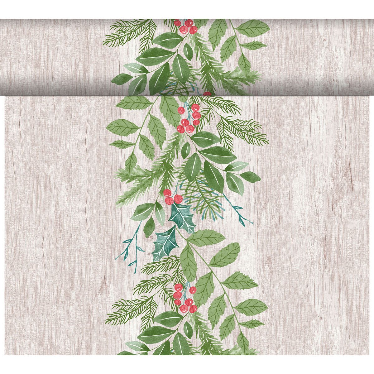 A vertical arrangement of green leaves, pine branches, and red berries decorates the Dunicel-Tete a Tete 0.4x24m table runner from Duni GmbH against a light wooden background with a festive repeat pattern at the top edge.