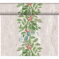 A vertical arrangement of green leaves, pine branches, and red berries decorates the Dunicel-Tete a Tete 0.4x24m table runner from Duni GmbH against a light wooden background with a festive repeat pattern at the top edge.