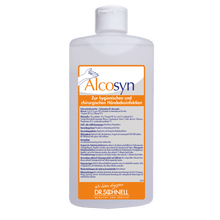 A white plastic bottle with the inscription "Dr. Schnell ALCOSYN hand sanitizer" by DR.SCHNELL GmbH & Co. KGaA with blue and orange accents shows the German instructions for use for a skin-friendly hand disinfectant.