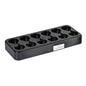 The Duni GmbH LED charging station, spare part for various models | Carton (1 piece), is a black plastic charging station with ten round slots and a white label on the front right side, depicted on a simple white background.