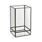 The Capella Lantern Glass, black by Duni GmbH is a rectangular glass lantern with a black metal frame, standing upright on a white background. The clear sides and base make it ideal for stylish lighting in any room.