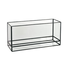 The Capella Lantern Glass, black by Duni GmbH stands empty against a white background. With its elegant rectangular glass and black metal frame, it is ideal for stylish lighting in any room.