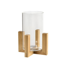 The glass lantern, 12x12x17 cm from Duni GmbH, stylishly combines wood and glass and is an elegant home accessory for any room as a decorative table lantern from the ESME series.