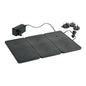 Three black rectangular electronic heating pads are connected to each other next to an LED charging station for lamps (1 piece) from Duni GmbH with multiple sockets and a power adapter on a white background.