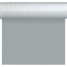 A roll of Dunisilk Tete a Tete 0.4x24m silver from Duni GmbH is partially unrolled with a smooth surface - ideal for elegant table decoration. The high-quality tablecloth (pack of 1 piece) is presented at the top of the image.