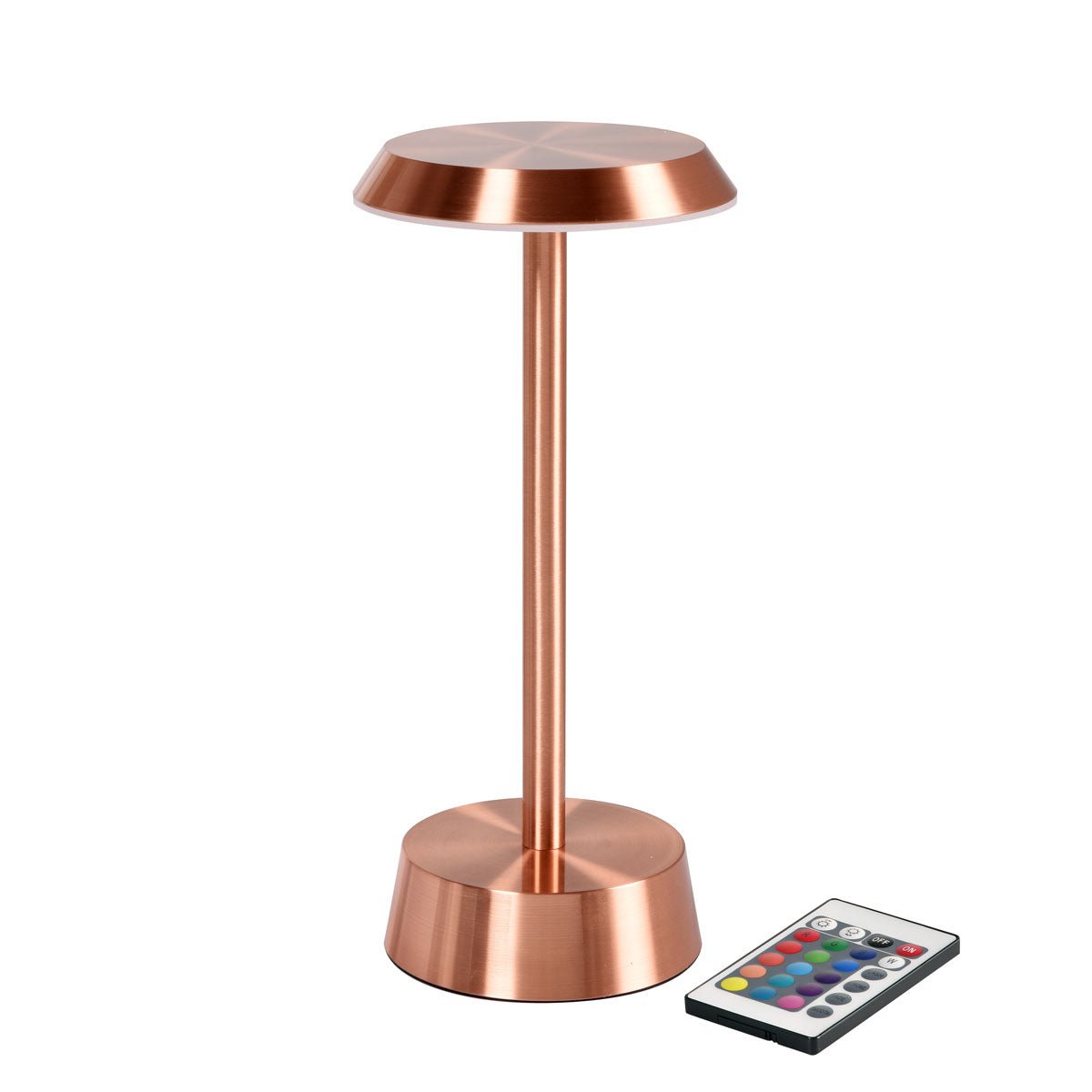 The NOUR wireless LED lamp in rose gold from Duni GmbH has a round base and flat top for a modern style. Next to the lamp is a remote control with colorful buttons.